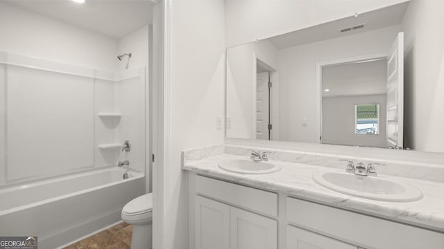 712 Curb Ct, Locust Grove, GA 30248 - full bath with double vanity, shower / washtub combination, and toilet