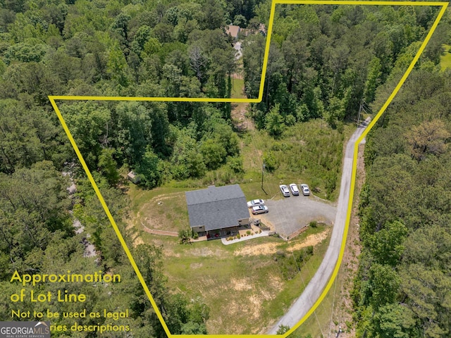 212 Postell Rd, Dallas, GA 30157 - aerial overview of property's location with a heavily wooded area and property parcel outlined