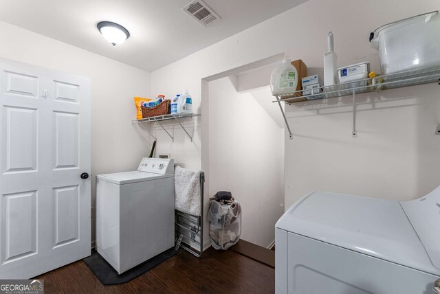 212 Postell Rd, Dallas, GA 30157 - washroom featuring washer and dryer and dark wood-type flooring