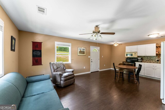 212 Postell Rd, Dallas, GA 30157 - living room with dark wood finished floors and ceiling fan