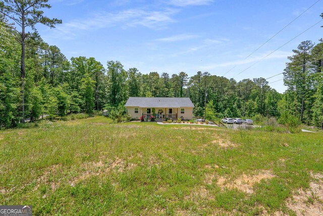 212 Postell Rd, Dallas, GA 30157 - view of front of home featuring a forest view
