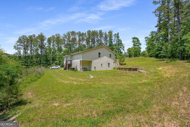 212 Postell Rd, Dallas, GA 30157 - view of home's exterior featuring a lawn