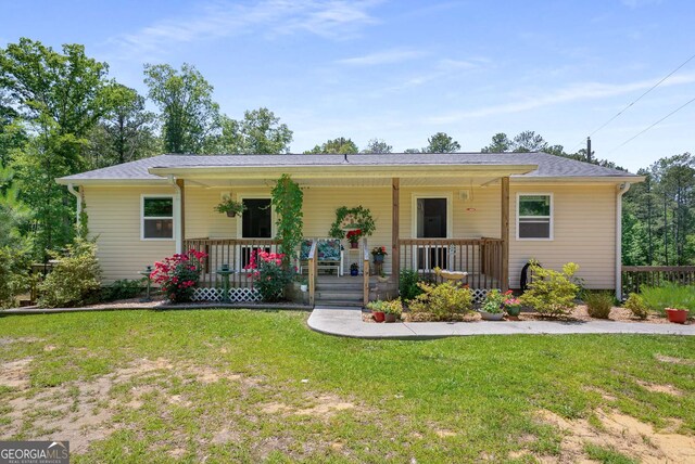 212 Postell Rd, Dallas, GA 30157 - view of front of property featuring covered porch and a front lawn