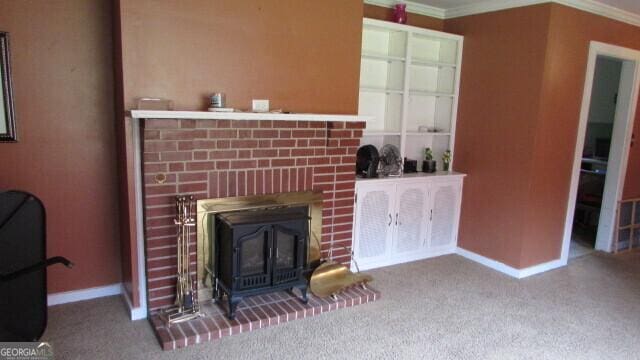215 Poplar Cir, Lagrange, GA 30241 - unfurnished living room featuring carpet floors, crown molding, baseboards, and a wood stove