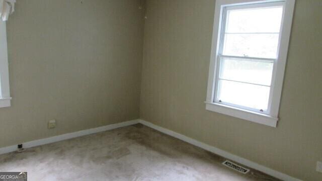 215 Poplar Cir, Lagrange, GA 30241 - empty room featuring baseboards and carpet floors