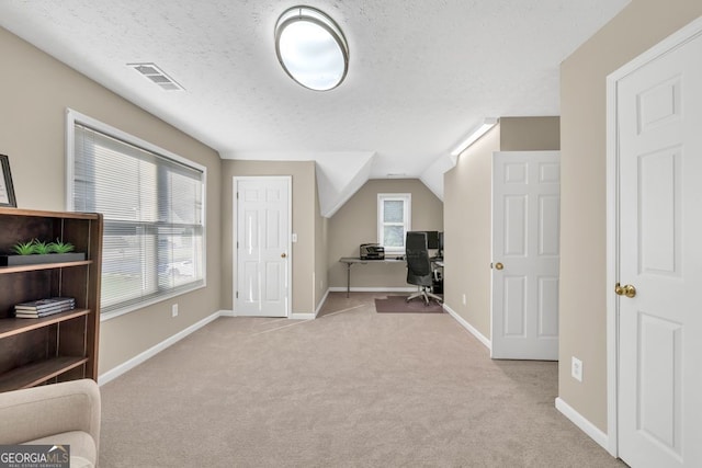 4174 Chatham Crest Ln, Buford, GA 30518 - carpeted office space featuring baseboards, a textured ceiling, and vaulted ceiling
