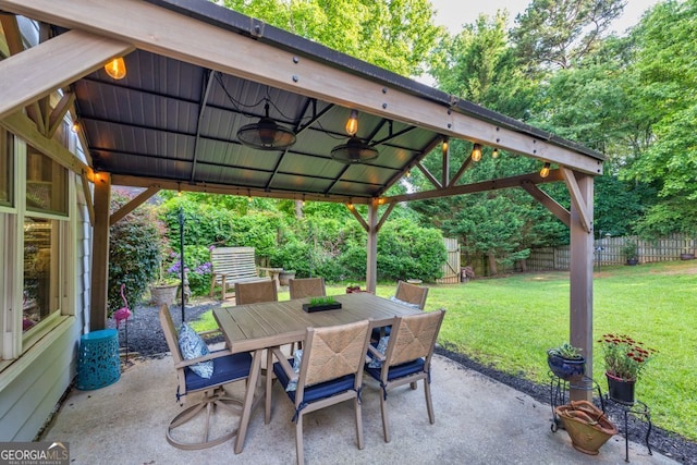 4174 Chatham Crest Ln, Buford, GA 30518 - view of patio featuring ceiling fan, a gazebo, and outdoor dining space
