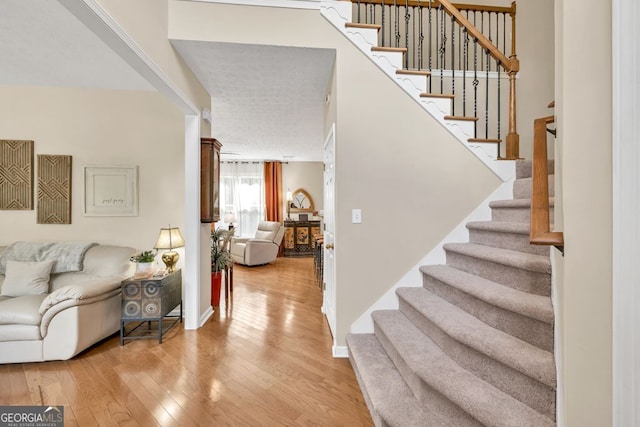 4174 Chatham Crest Ln, Buford, GA 30518 - stairway featuring wood-type flooring and baseboards