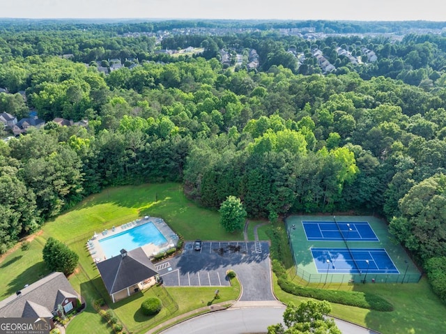 4174 Chatham Crest Ln, Buford, GA 30518 - aerial view of a pool area and a heavily wooded area