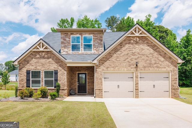 1225 Hibiscus Way, Mcdonough, GA 30253 - craftsman-style home featuring driveway, a front lawn, an attached garage, and brick siding