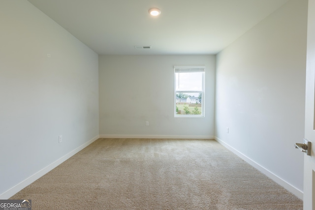 1225 Hibiscus Way, Mcdonough, GA 30253 - carpeted empty room featuring baseboards