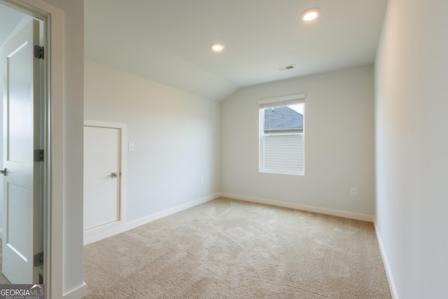 1225 Hibiscus Way, Mcdonough, GA 30253 - unfurnished room with carpet, lofted ceiling, baseboards, and recessed lighting