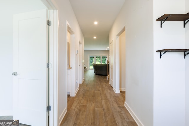 1225 Hibiscus Way, Mcdonough, GA 30253 - corridor featuring recessed lighting, wood finished floors, and baseboards