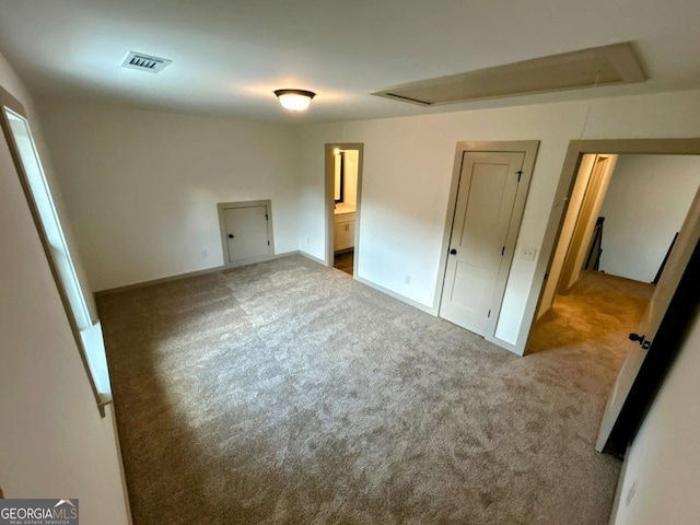 297 Ayers Creek Dr, Toccoa, GA 30577 - unfurnished bedroom featuring attic access, carpet flooring, connected bathroom, and baseboards