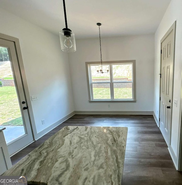297 Ayers Creek Dr, Toccoa, GA 30577 - unfurnished dining area with healthy amount of natural light, a chandelier, and dark wood-style floors