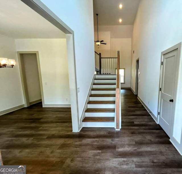 297 Ayers Creek Dr, Toccoa, GA 30577 - stairs featuring a chandelier, wood finished floors, a towering ceiling, ceiling fan, and recessed lighting