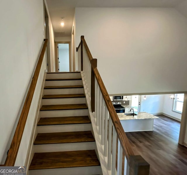 297 Ayers Creek Dr, Toccoa, GA 30577 - stairway featuring wood finished floors and baseboards