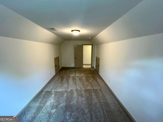 297 Ayers Creek Dr, Toccoa, GA 30577 - bonus room featuring carpet, vaulted ceiling, and baseboards