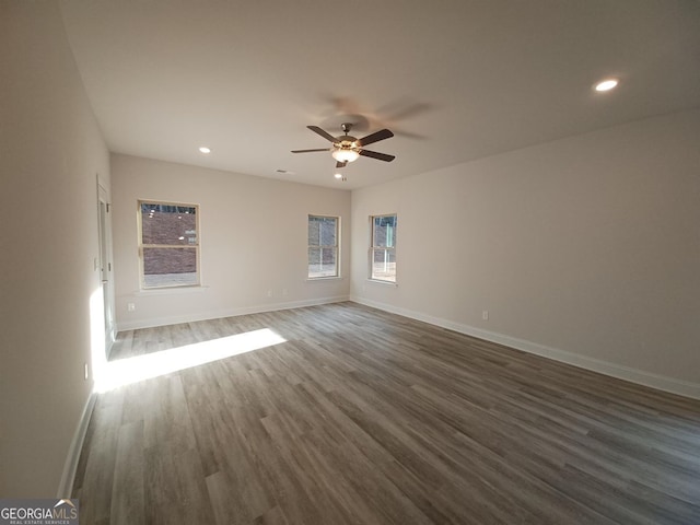 285 Magnolia Villas Dr, Cornelia, GA 30531 - empty room featuring dark wood finished floors, ceiling fan, recessed lighting, and baseboards