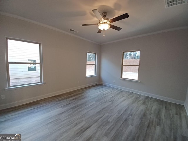 285 Magnolia Villas Dr, Cornelia, GA 30531 - unfurnished room with wood finished floors, ornamental molding, baseboards, and ceiling fan