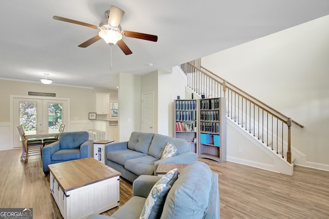 133 Coldwater Ln, Griffin, GA 30224 - living area featuring stairs, light wood finished floors, and french doors