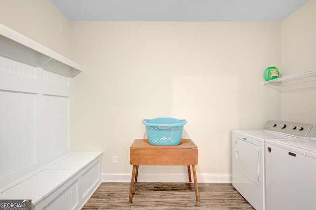 133 Coldwater Ln, Griffin, GA 30224 - washroom featuring washing machine and clothes dryer and light wood-style floors