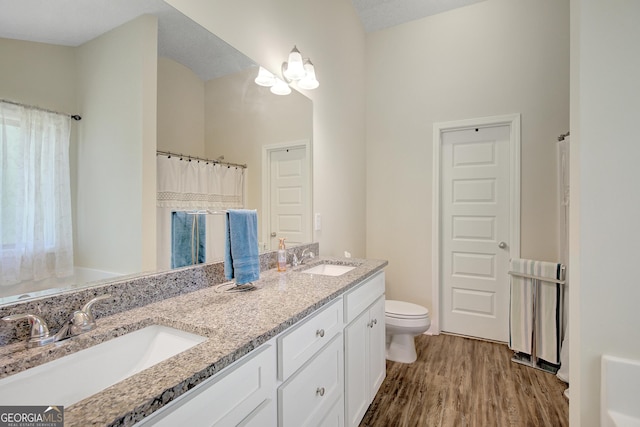 133 Coldwater Ln, Griffin, GA 30224 - full bath with double vanity and wood finished floors