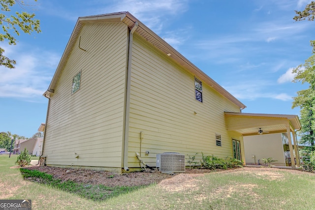 133 Coldwater Ln, Griffin, GA 30224 - view of property exterior with a ceiling fan and a lawn