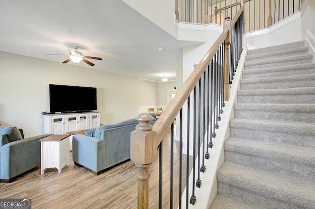 133 Coldwater Ln, Griffin, GA 30224 - staircase with a ceiling fan and wood finished floors