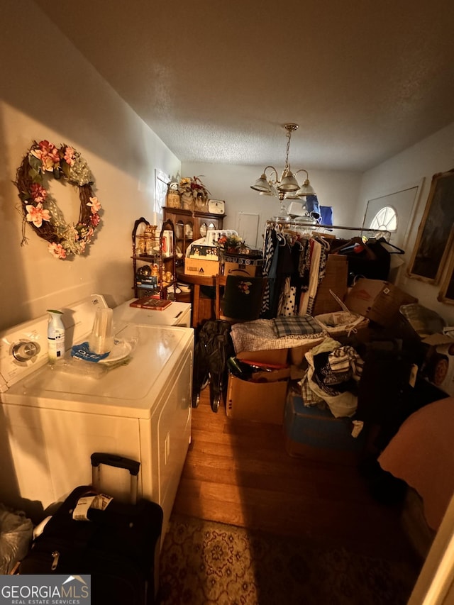 2019 Cason Dr, Vidalia, GA 30474 - dining room with wood finished floors, a chandelier, and a textured ceiling