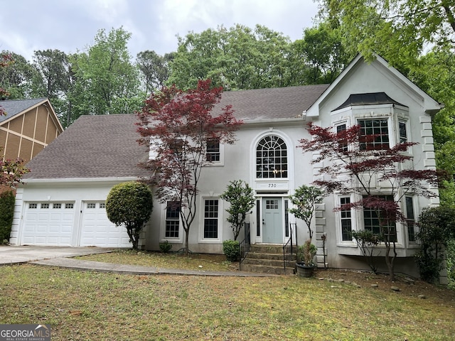 730 Redlion Run, Alpharetta, GA 30022 - view of front of home featuring a garage, concrete driveway, stucco siding, a front lawn, and a shingled roof