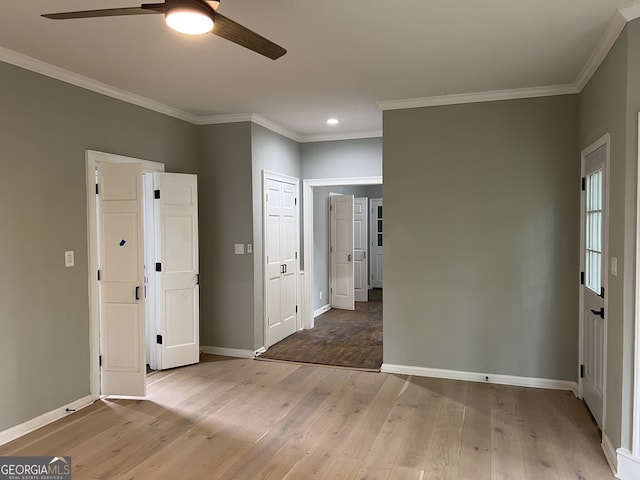 730 Redlion Run, Alpharetta, GA 30022 - unfurnished bedroom featuring light wood-type flooring, crown molding, baseboards, recessed lighting, and ceiling fan