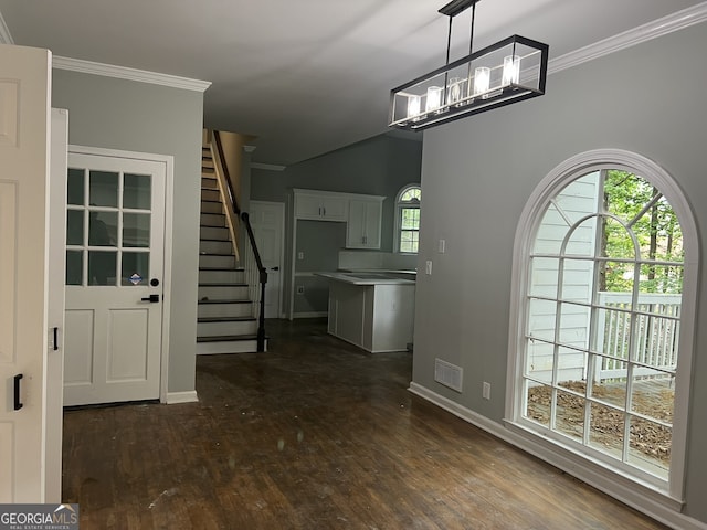 730 Redlion Run, Alpharetta, GA 30022 - foyer entrance featuring dark wood-style floors, baseboards, crown molding, and stairs