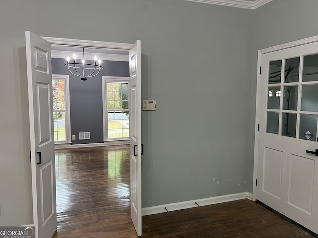 730 Redlion Run, Alpharetta, GA 30022 - unfurnished dining area with ornamental molding, a chandelier, dark wood finished floors, and baseboards