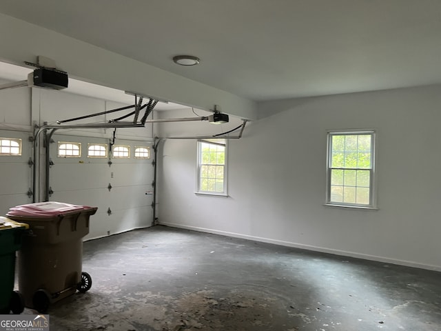 730 Redlion Run, Alpharetta, GA 30022 - garage featuring a garage door opener and baseboards