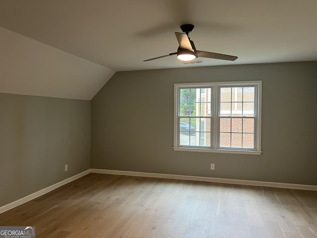 730 Redlion Run, Alpharetta, GA 30022 - additional living space with ceiling fan, lofted ceiling, wood finished floors, and baseboards