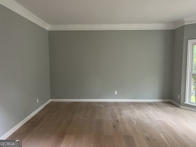 730 Redlion Run, Alpharetta, GA 30022 - empty room featuring ornamental molding, baseboards, and light wood-style flooring