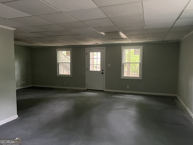 730 Redlion Run, Alpharetta, GA 30022 - spare room featuring unfinished concrete floors, baseboards, and a paneled ceiling