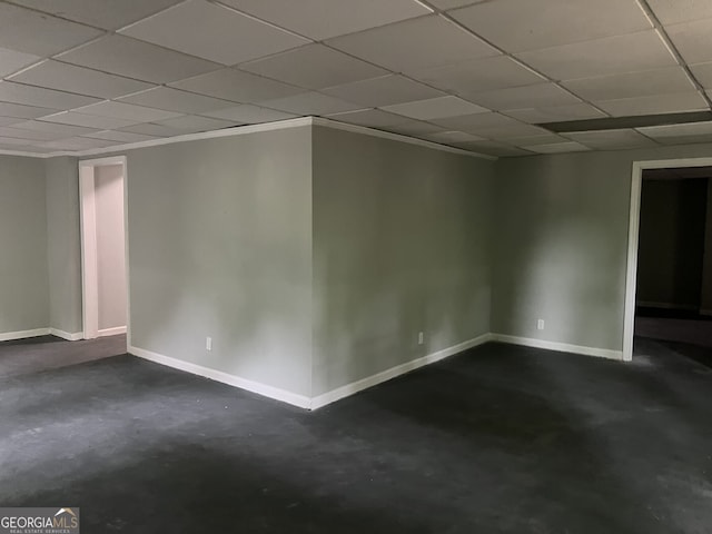 730 Redlion Run, Alpharetta, GA 30022 - empty room featuring unfinished concrete floors, baseboards, and a paneled ceiling