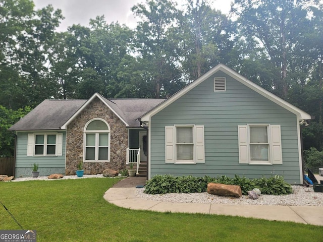 58 First Manassas Way E, Sharpsburg, GA 30277 - ranch-style home with a front lawn and stone siding