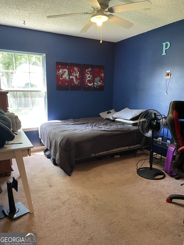 102 Driftwood Ct, Kingsland, GA 31548 - bedroom with carpet floors, a textured ceiling, and a ceiling fan