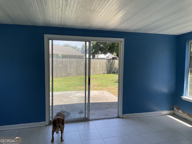 102 Driftwood Ct, Kingsland, GA 31548 - doorway featuring healthy amount of natural light, baseboards, and tile patterned floors