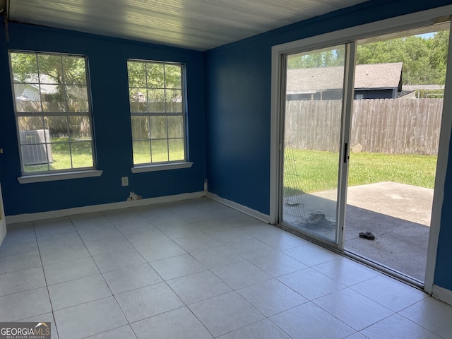 102 Driftwood Ct, Kingsland, GA 31548 - spare room featuring plenty of natural light, tile patterned flooring, and baseboards