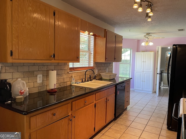 102 Driftwood Ct, Kingsland, GA 31548 - kitchen featuring a sink, black appliances, decorative backsplash, light tile patterned flooring, and ceiling fan