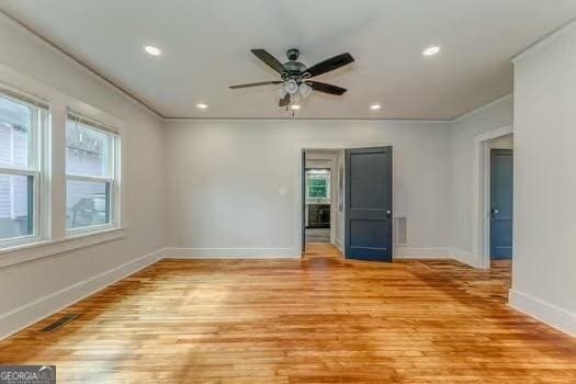 2 E 10th St SW, Rome, GA 30161 - spare room featuring healthy amount of natural light, baseboards, light wood-style floors, a ceiling fan, and recessed lighting