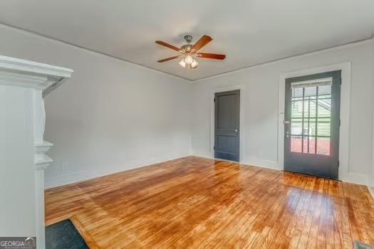 2 E 10th St SW, Rome, GA 30161 - empty room with a ceiling fan and hardwood / wood-style flooring