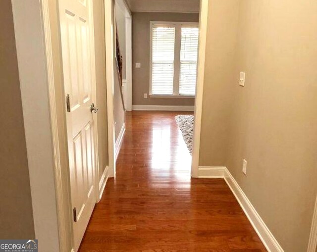 779 Avonley Creek Trce, Buford, GA 30518 - hallway with wood finished floors and baseboards