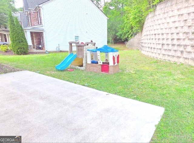 779 Avonley Creek Trce, Buford, GA 30518 - view of green lawn with a playground
