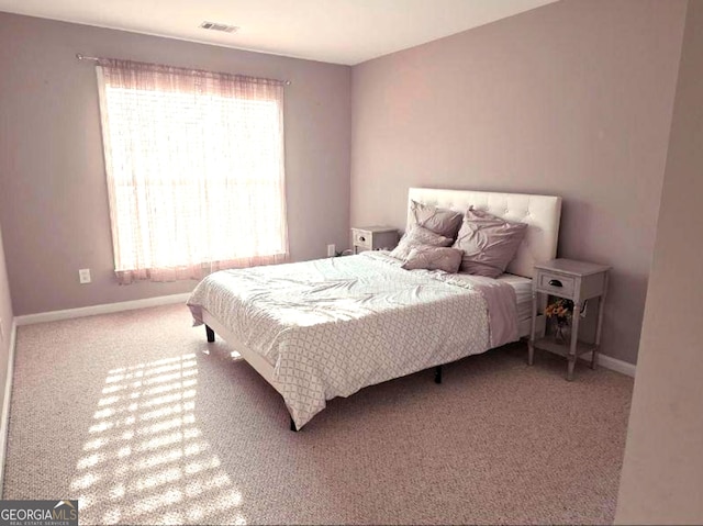 779 Avonley Creek Trce, Buford, GA 30518 - carpeted bedroom featuring baseboards