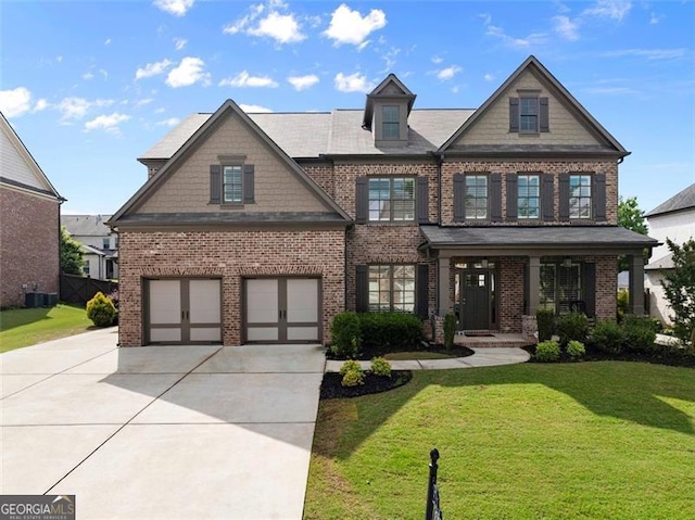 3317 Sweetleaf Ln, Buford, GA 30519 - craftsman-style house featuring brick siding, driveway, a front yard, and an attached garage